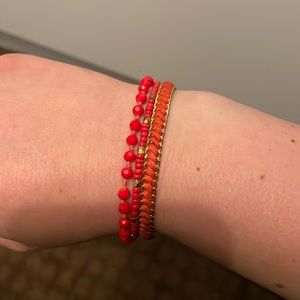 Henry Bendel orange/gold colored beaded bracelet